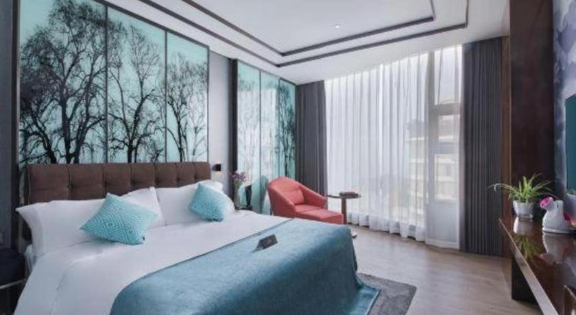 Xana Hotelle-Hotel Luzhou Baizitu Square Exterior photo
